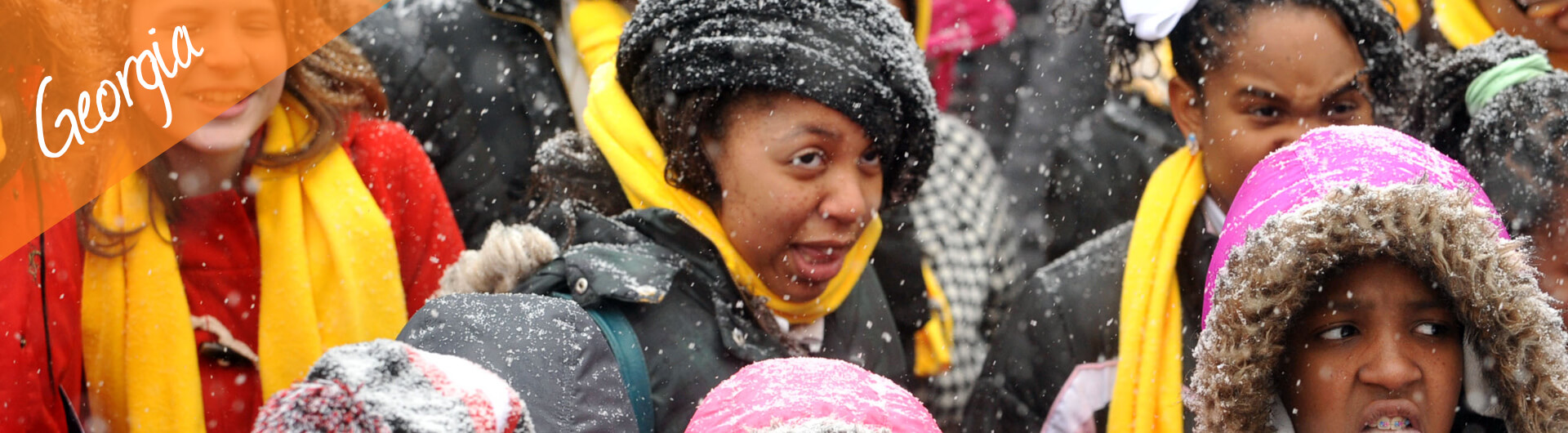 Georgia Car Donation Banner | People Bundled Up as Snow Falls